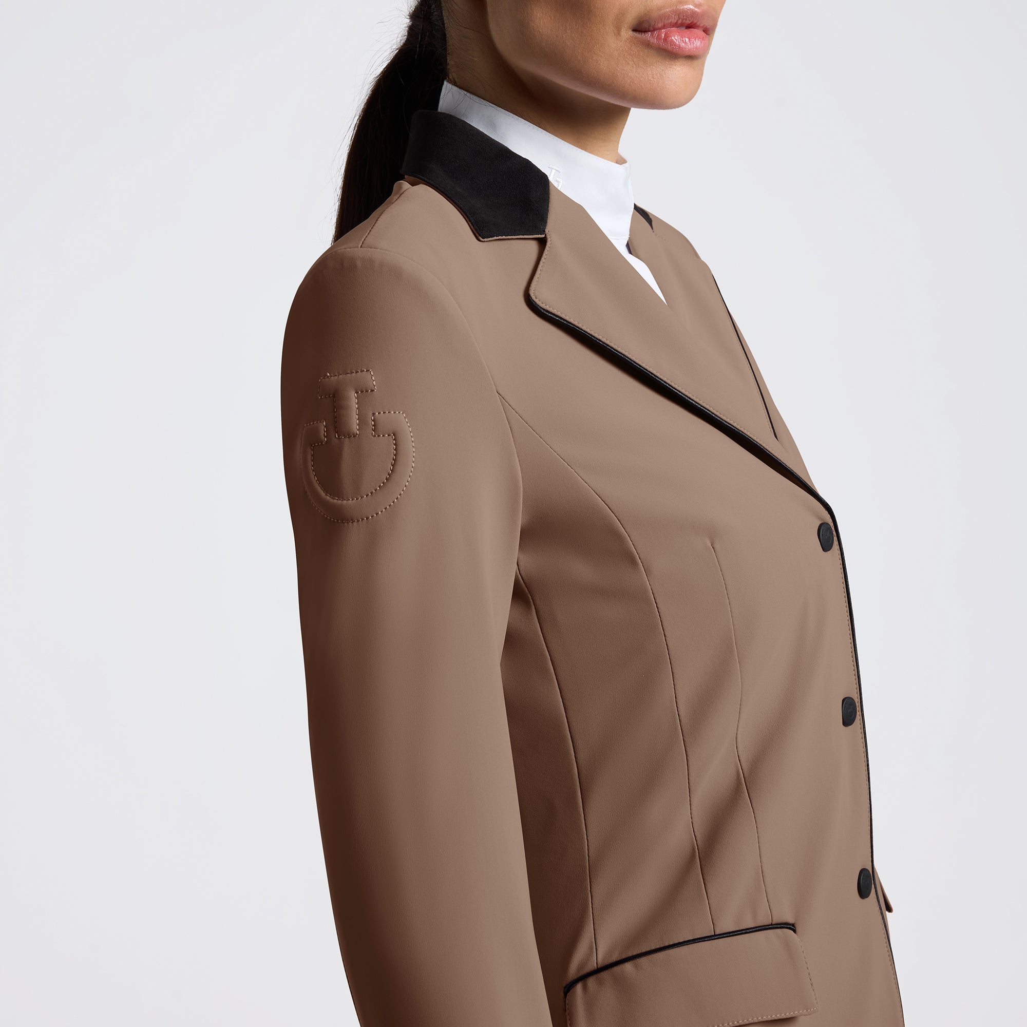 Elevate your riding experience with the Cavalleria Toscana GP Riding Jacket. Designed for both style and performance, this jacket offers a sleek fit that moves with you, ensuring comfort during every ride. Crafted from high-quality materials, it provides breathability and durability, making it ideal for competitive and casual equestrians alike. Embrace elegance and functionality in one essential piece of riding apparel.