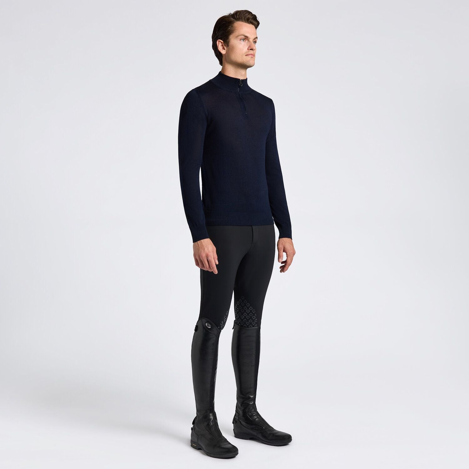 Experience luxury and style with the Cavalleria Toscana Merinos Half Zip Turleneck Sweater. Made with high-quality merino wool, this sweater offers unparalleled warmth and softness. The half zip and turtleneck design provide versatility, while maintaining a sleek and sophisticated look. Elevate your wardrobe with this must-have piece!