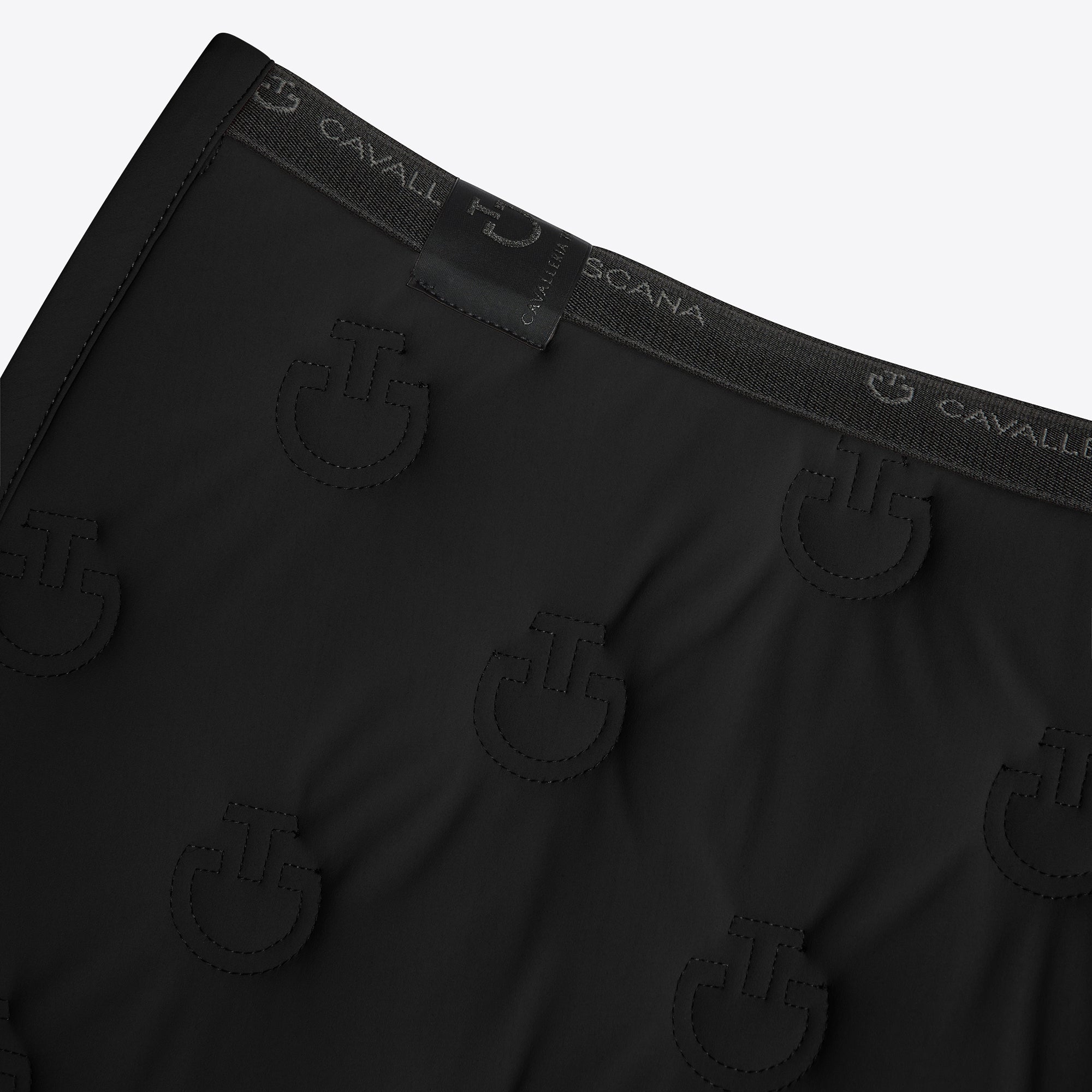 Close-up of black Cavallé Scana boxer briefs showing the waistband with the brand name and the embossed logo pattern.