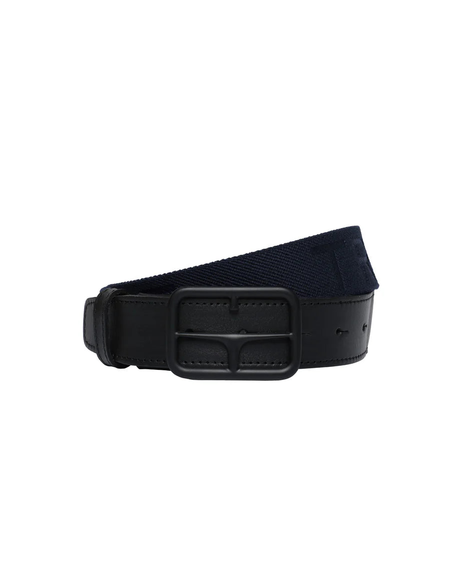 Experience comfort and style with our Trolle Mat Logo Belt W Elastic Navy! This belt features a unique logo design and is made with elastic for a snug, comfortable fit. Perfect for adding a touch of personality to any outfit. Grab yours today and elevate your wardrobe!
