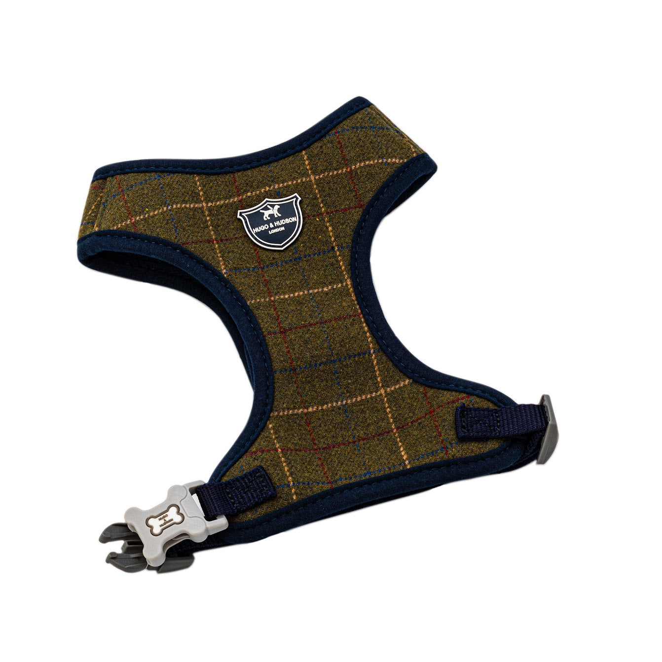 Hugo and Hudson Dark Green Tweed Harness The green dog harnesses are designed to help prevent your dog from pulling, whilst reducing pressure on their neck. The harness is designed so your dog will look and feel great, with four different sizes, that are adjustable , are available to get the perfect fit.