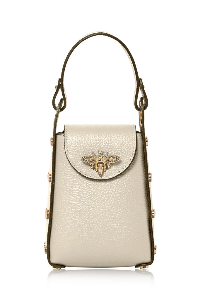 The leather bee bag is an Elegant and Fashionable Small Size Handbag. It has a dual option as a Crossbody Bag or handle, it comes with a Detachable Golden Bag Chain. The bag has Enough Space for Essential Small Items for when your out and about. The bag is Decorated with Bee-shaped Snap that discretely creates the clasp.