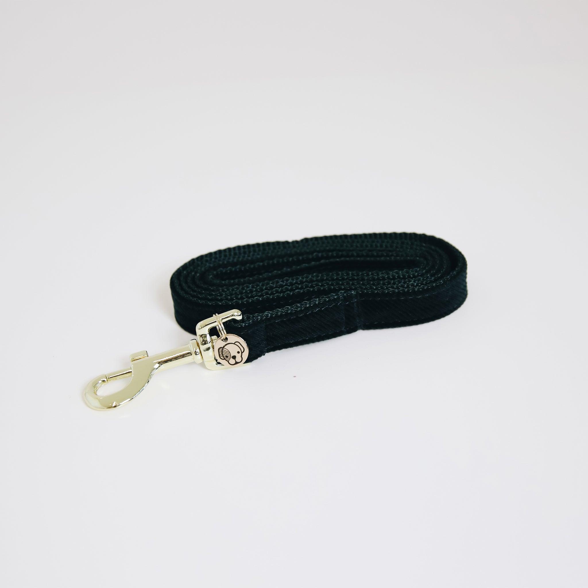 The Kentucky Corduroy lead. Give your dog the luxury it deserves. The lead is made from a super soft baby cord and lined with nylon for extra strength and durability. The lead features the gold Kentucky logo clasp and gold dog tag to engrave your details.