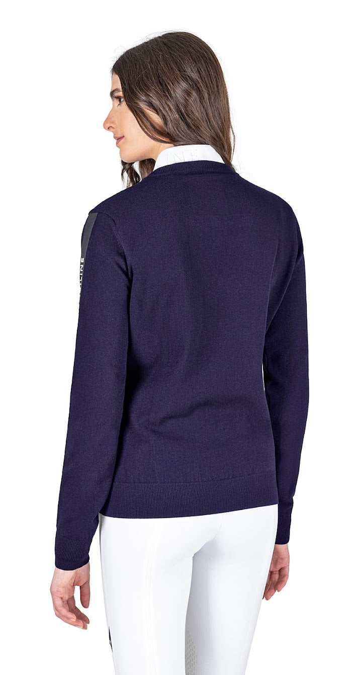 The Equiline Cinoc Pullover is the perfect jumper for training or to complete your competition look. This knitted V neck sweater is is finished with contemporary black table town the sleeve with Equiline written in White. Available in Cobalt Blue or Black.