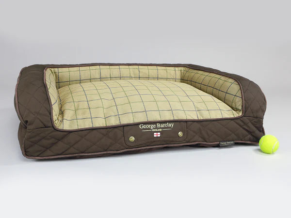 The George Barclay Monxton, sofa bed, has been produced using the finest quality upholstery fabric. A soft woven fabric covers the centre pillow and inner sidewalls, this is paired with contrasting faux leather exterior. The bed is finished with faux suede piping, with an embossed faux leather centre patch, which includes an English flag emblem to complete the beds signature styling.