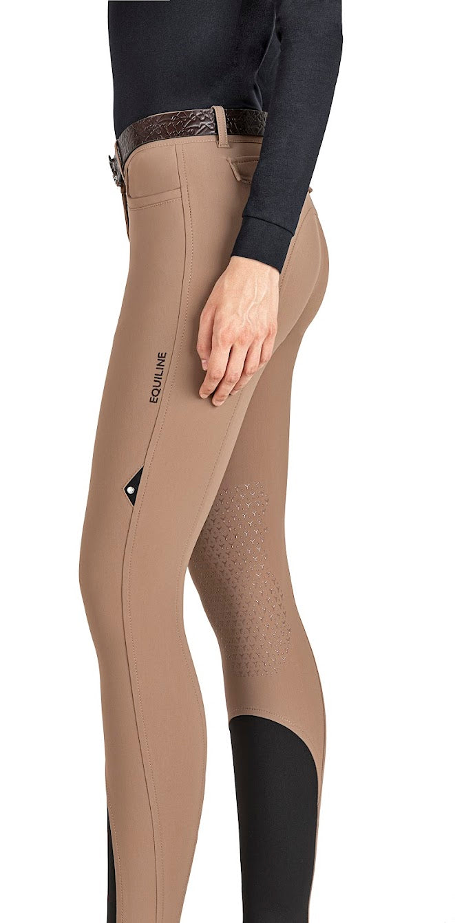The Equiline Camel Etraek breeches are made from the new B Move bonded fabric for flexibility and durability when riding. Finished with a silicone knee grip for security in the saddle and an elasticatend fabric on the lower leg for close contact.
