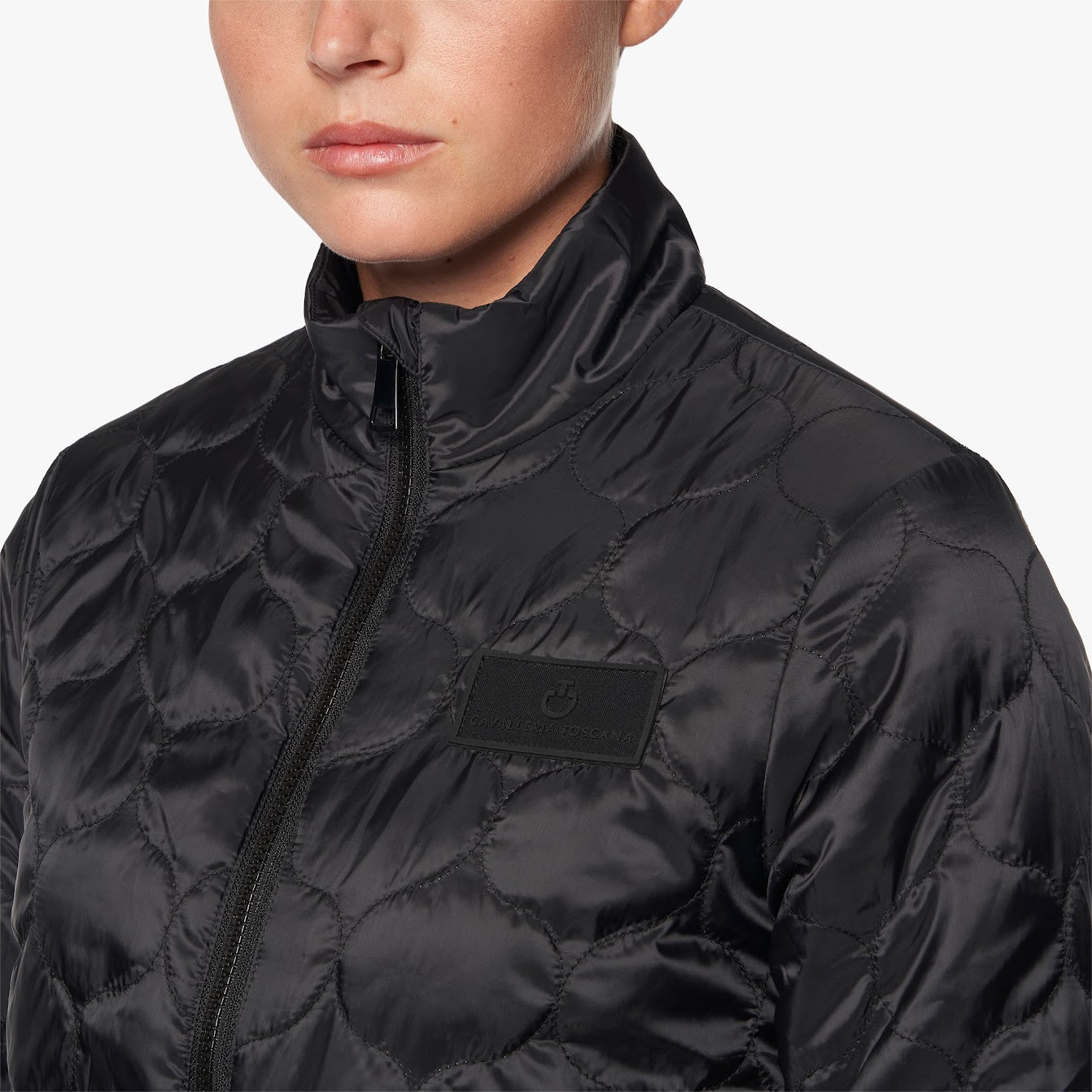 The Cavalleria Toscana Revo 3 way Waterproof Jacket with detachable puffer is the only coat you need this season. Perfect for our ever changing weather. The outer is fully waterproof and the inner puffer coat seamlessly zips inside, giving you three jackets in one. This versatile CT Revolution jacket has stylish gold accents that compliment the CT Revolution collection. It’s technical features are designed for the rider with side sips ensuring maximum comfort and movement.