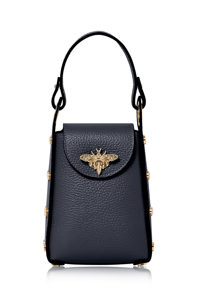 The leather bee bag is an Elegant and Fashionable Small Size Handbag. It has a dual option as a Crossbody Bag or handle, it comes with a Detachable Golden Bag Chain. The bag has Enough Space for Essential Small Items for when your out and about. The bag is Decorated with Bee-shaped Snap that discretely creates the clasp.
