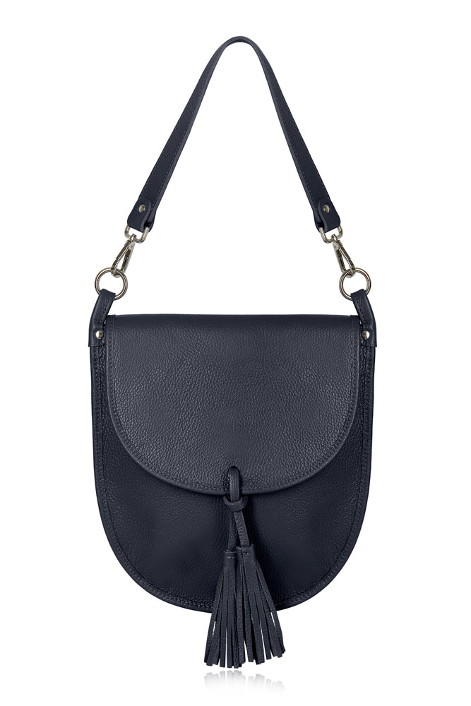 this is the perfect stylish bag for the autumn. The luxury leather bag has two lined compartments inside and a zip inner pocket. Optional over the shoulder strap and also comes with a longer strap. Popper front fastening with two tassels. Size:L: 29CM H: 30CM D: 1.5CM