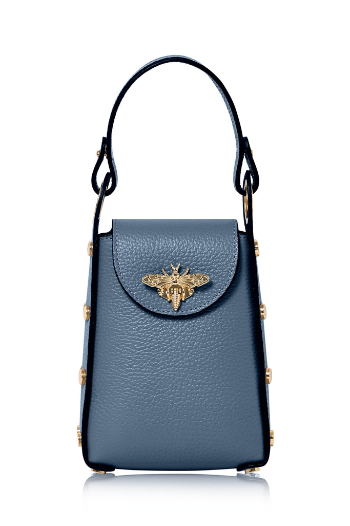 The leather bee bag is an Elegant and Fashionable Small Size Handbag. It has a dual option as a Crossbody Bag or handle, it comes with a Detachable Golden Bag Chain. The bag has Enough Space for Essential Small Items for when your out and about. The bag is Decorated with Bee-shaped Snap that discretely creates the clasp.