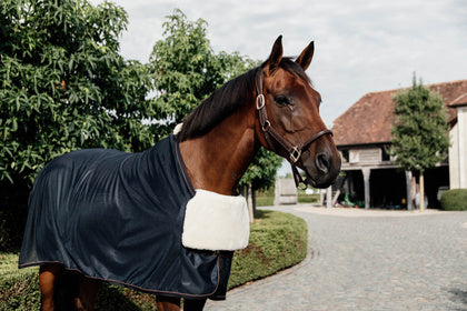 The Kentucky Horsewear Horse Bib Chest Protection Sheepskin is great to protect your horse from horse rugs that rub. Made in one piece of high quality artificial sheepskin that will fold in half to be positioned in front of the horse rug. Simply place the sheepskin side against the horse’s chest. As a result this will provide maximum comfort for your horse.