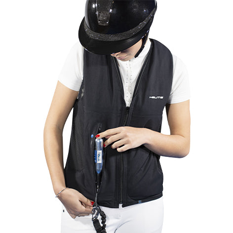 The Zip In 2 by Helite is the new 2 in 1 vest which offers the rider a great freedom of movement and protection with the quickest inflation time on the market. n the event of a fall the airbag inflates in less than 0,1 seconds and offers an optimal protection from head to tailbone before impact. Due to the central zip, the airbag can be worn alone, however it is recommended to wear the Zip’In 2 airbag with an approved outer.