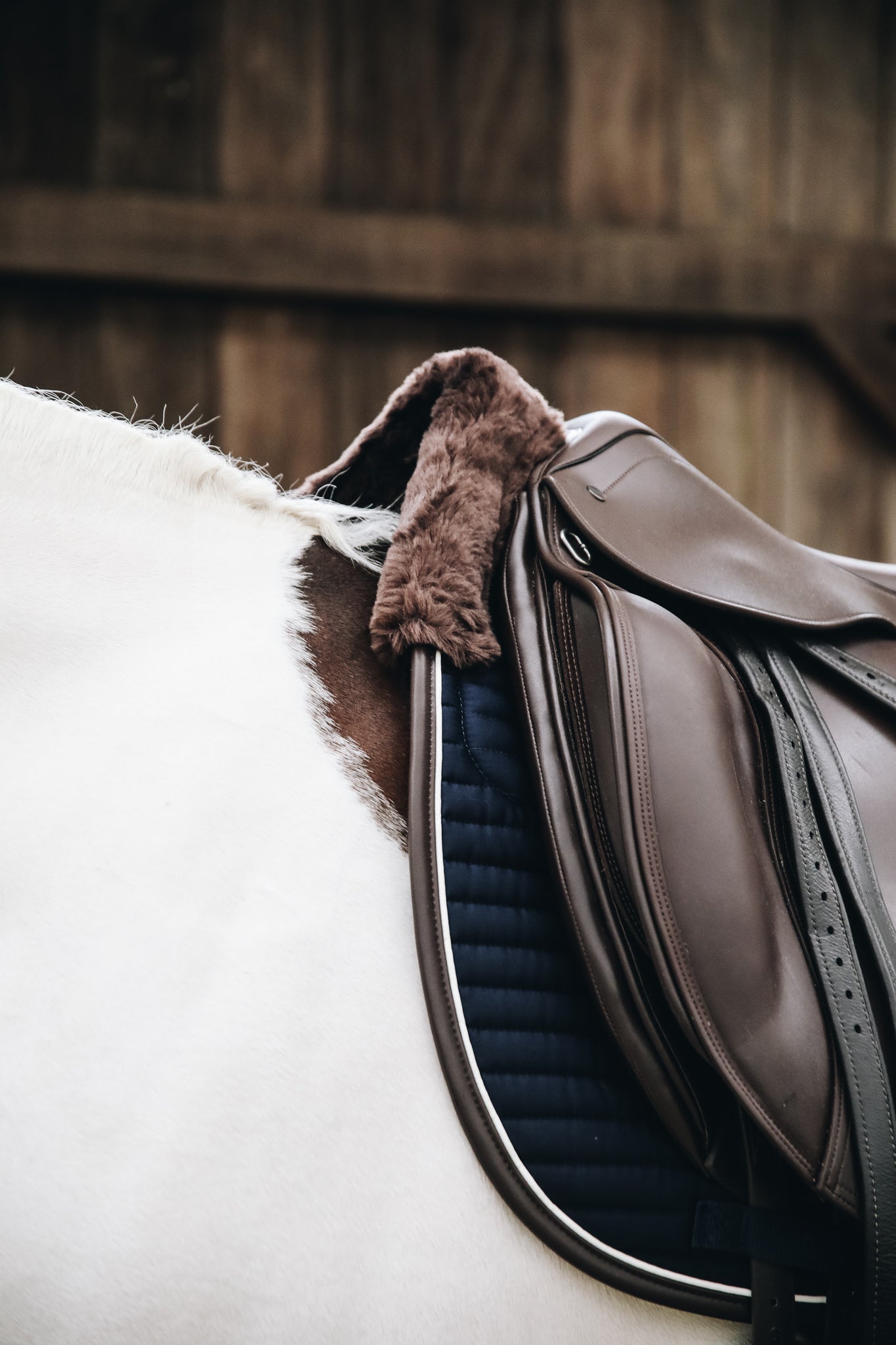 The Kentucky Horsewear Skin Friendly Dressage Pad offers extreme cushioning and support between the horses back and the saddle whilst preventing friction.