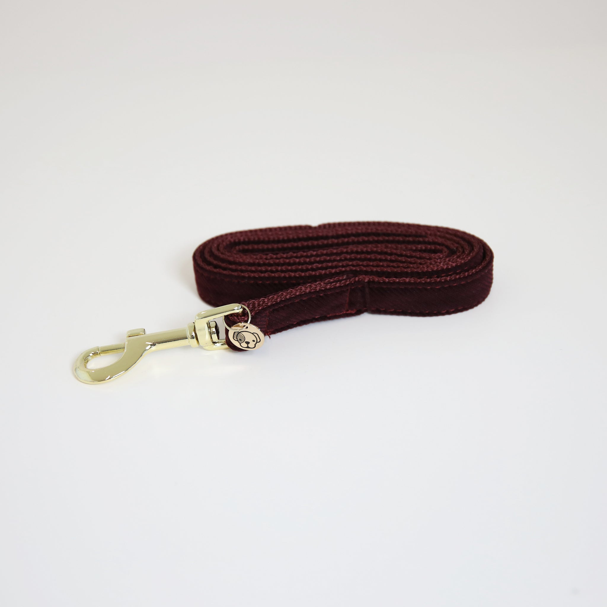The Kentucky Corduroy lead. Give your dog the luxury it deserves. The lead is made from a super soft baby cord and lined with nylon for extra strength and durability. The lead features the gold Kentucky logo clasp and gold dog tag to engrave your details.