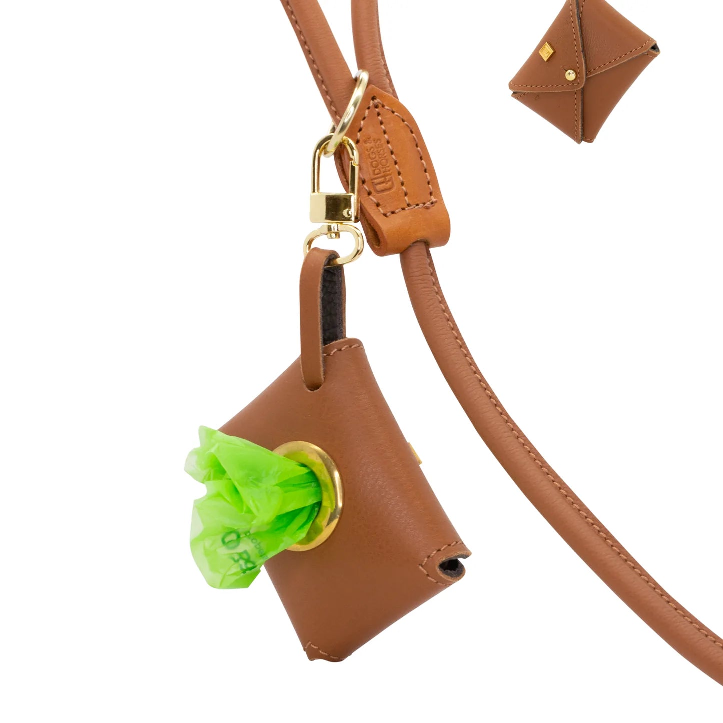 Dogs and horses Poosh leather poo-bag dispenser available in our House and Traditional colours as well as Spring-Summer and Autumn-Winter shades. Features a strong clip to attach to the O-ring in your dog lead (or anywhere else). Accommodates one standard size poo-bag roll which you can pull free one at a time through the porthole.