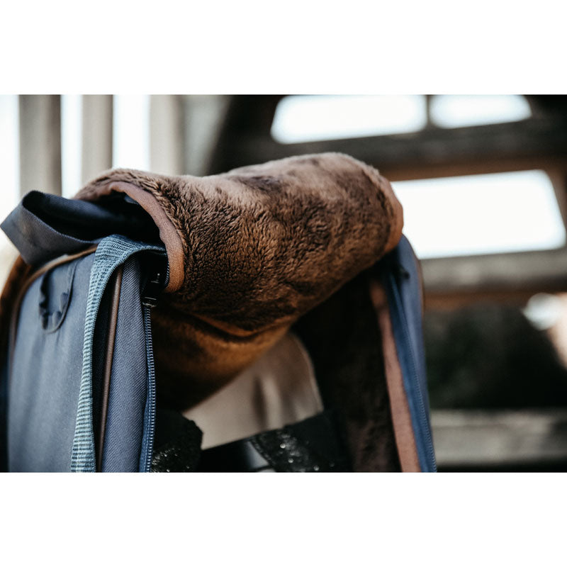 The Kentucky Horsewear Boot Bag offers protection to your riding boots during transportation, at shows and also at home. The Bag is lined with luxurious artificial faux fur on the inside to avoid scratches on the soft leather of your riding boots. The tag features a Kentucky name tag on the front can be turned over and personalized. The bag had two handles on the top and a nylon carry to strap that can be adjusted to make it easy to carry.