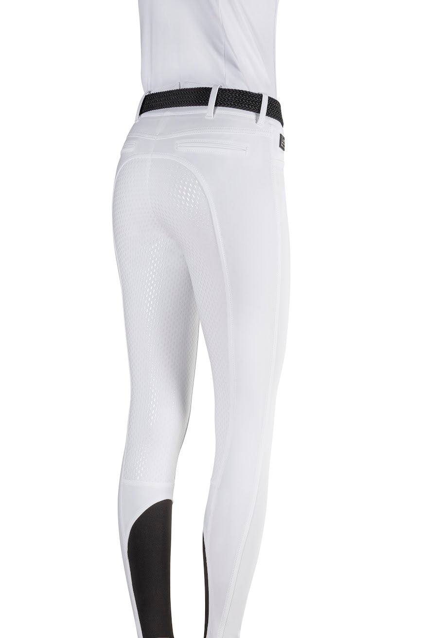 The Equiline Adellek Full Grip White Breeches are made from the new B-Move Fabric, offering breathability and durability. The silicone full seat provides stability in the saddle, and finished with a high waistband.