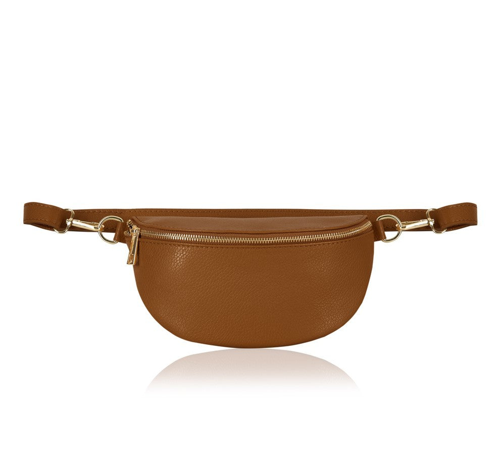 Italian leather Cross over bag The perfect bag for all occasions. Made from Italian leather this bag can be worn as a cross over bag, over the shoulder or around the waist. A great bag for all those bits at the show or at the bar so your hands are free. Please note this Item is not available on express delivery.
