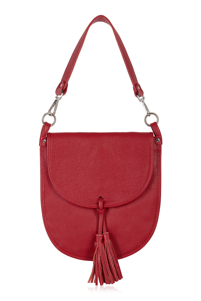 this is the perfect stylish bag for the autumn. The luxury leather bag has two lined compartments inside and a zip inner pocket. Optional over the shoulder strap and also comes with a longer strap. Popper front fastening with two tassels. Size:L: 29CM H: 30CM D: 1.5CM