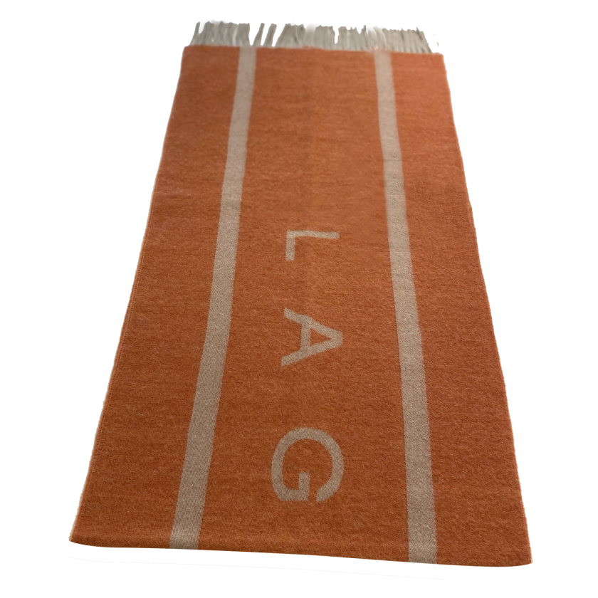 Laguso Signature orange scarf is the perfect accompaniment this season. The scarf is oversized and has a reversable design to give you maximum style options. Machine washable at 30’c