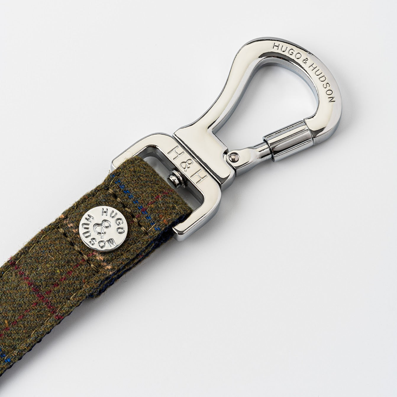 Hugo and Hudson Dark Green Tweed Dog Lead This beautiful dark green checked tweed lead is from the Hugo and Hudson premium fabric collection. It&
