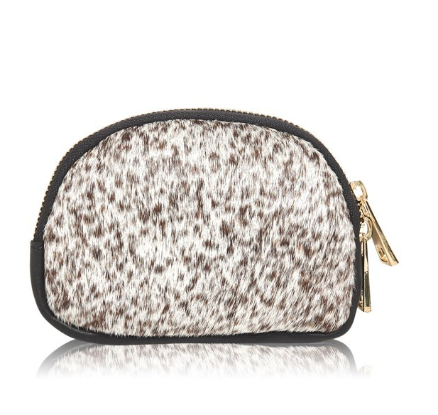 IG Equine Leather and Hide Coin Purse A great little coin purse or handy purse to put in your essentials. Made from super soft black leather back and hide front. Fully lined. The zip opens all the way across for easy access. Matching zippers to our ruck sacks and bags for great coordination. We love this little purse, looks great with the Moda in Pelle trainers or a great little gift. Please note the design maybe different on the pony. They are not all exactly the same.