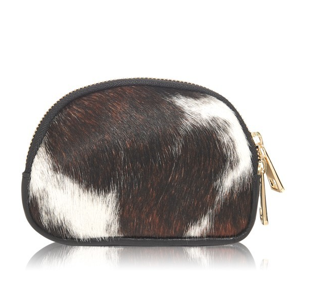 IG Equine Leather and Hide Coin Purse A great little coin purse or handy purse to put in your essentials. Made from super soft black leather back and hide front. Fully lined. The zip opens all the way across for easy access. Matching zippers to our ruck sacks and bags for great coordination. We love this little purse, looks great with the Moda in Pelle trainers or a great little gift. Please note the design maybe different on the pony. They are not all exactly the same.