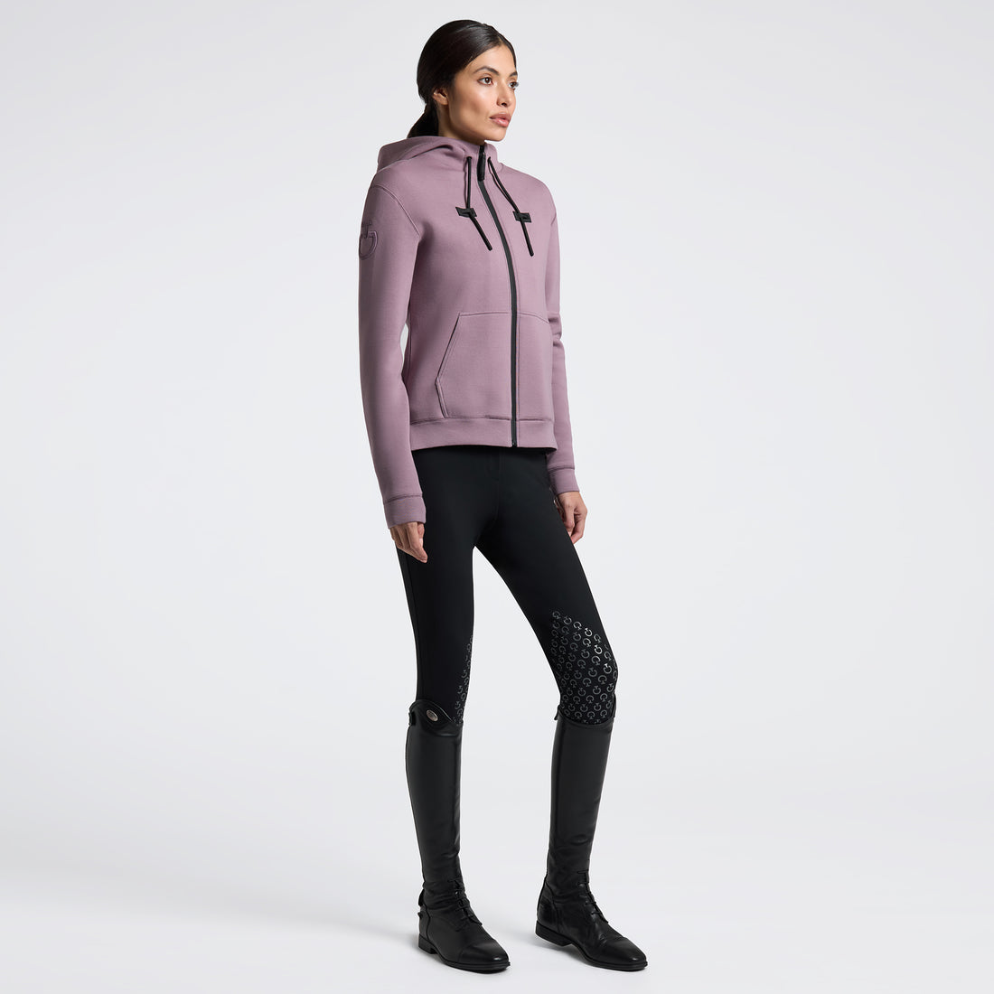 Experience comfort and style with the Cavalleria Toscana Cotton Zip Hoodie. Crafted from soft cotton, this hoodie offers breathable warmth and a perfect fit for everyday wear. Its full zip design allows easy layering, making it ideal for both casual outings and active days. Elevate your wardrobe with this versatile piece that combines practicality with timeless elegance.