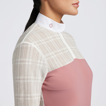 Showcase the Cavalleria Toscana Sheer Jacquard Jersey Zip Competition Shirt with images that emphasize its lightweight and breathable fabric. Highlight the sheer jacquard jersey material, zip closure, and tailored fit through a mix of close-up shots and action shots in an equestrian setting. Focus on the shirt&