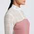 Showcase the Cavalleria Toscana Sheer Jacquard Jersey Zip Competition Shirt with images that emphasize its lightweight and breathable fabric. Highlight the sheer jacquard jersey material, zip closure, and tailored fit through a mix of close-up shots and action shots in an equestrian setting. Focus on the shirt&
