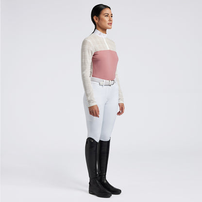 Showcase the Cavalleria Toscana Sheer Jacquard Jersey Zip Competition Shirt with images that emphasize its lightweight and breathable fabric. Highlight the sheer jacquard jersey material, zip closure, and tailored fit through a mix of close-up shots and action shots in an equestrian setting. Focus on the shirt&