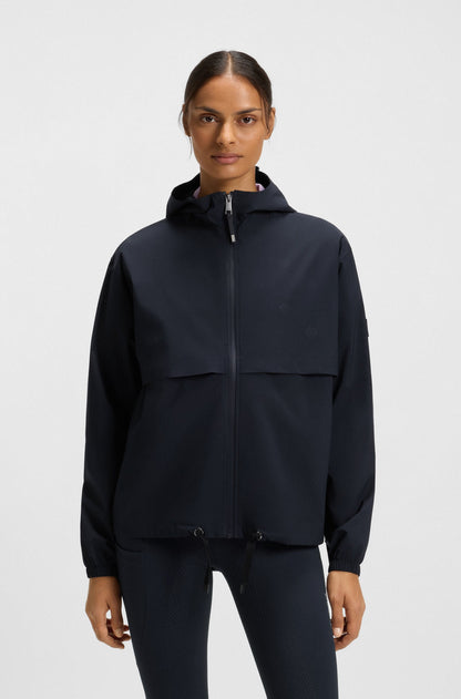 Person wearing a dark blue jacket on a white background