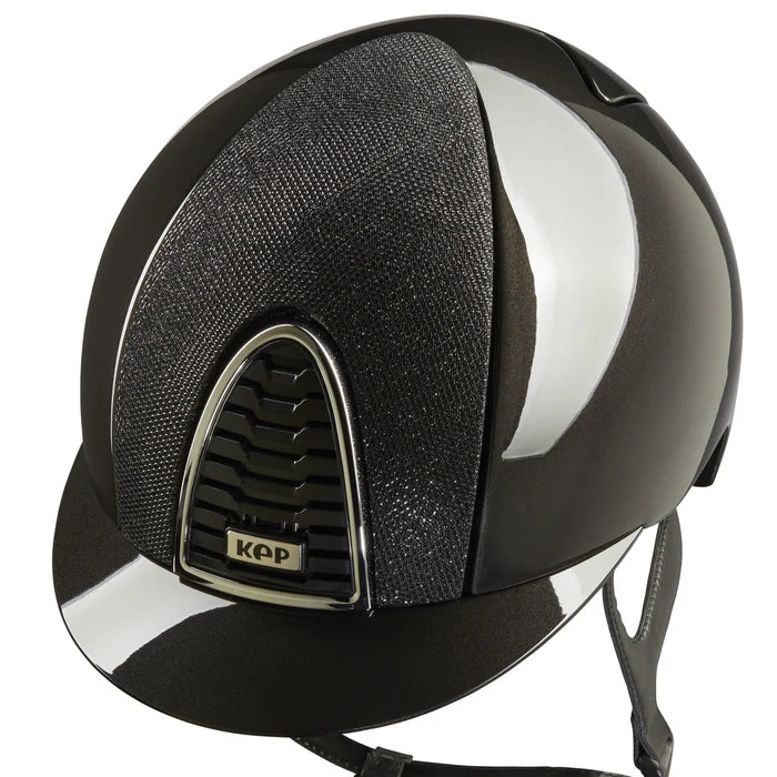 Experience unmatched style and safety with the Kep Cromo 2.0 Shine Black Luminor insert Polo Riding Hat. Designed to elevate your equestrian experience, this hat features a sleek black Luminor insert for added shine and protection. Ride with confidence and show off your unique sense of style.