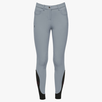 Light gray equestrian riding breeches with black knee panels and a small black logo on the left thigh, shown against a plain white background.