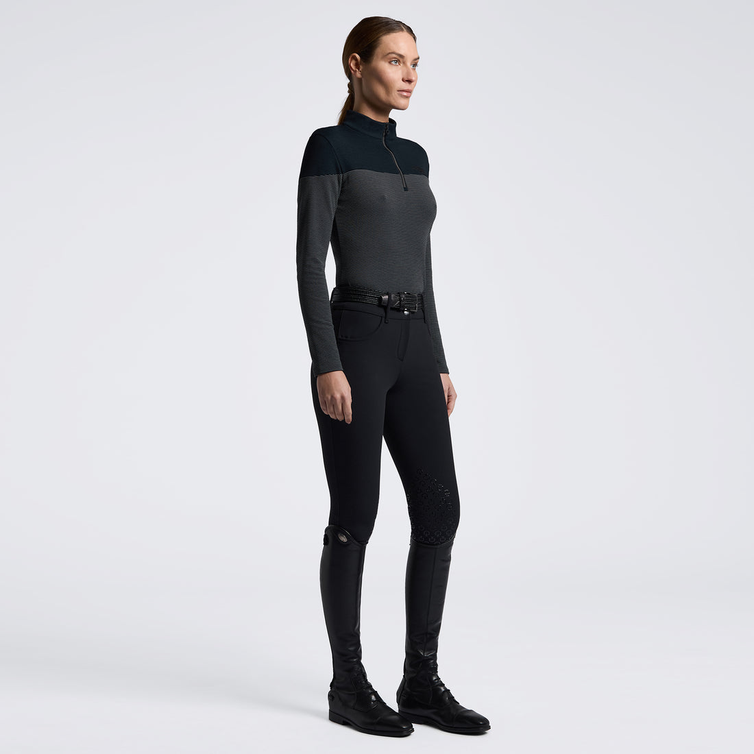 Black and white training top in women with white background