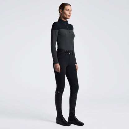 Black and white training top in women with white background
