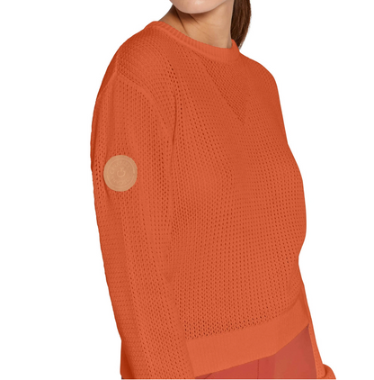 Close-up of luxurious cotton knit texture on Cavalleria Toscana Sweater in orange