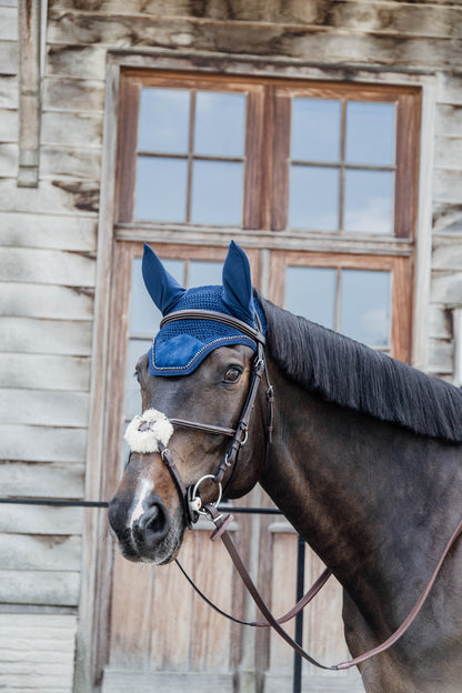 The Kentucky velvet and pearls fly veil. Made in the Wellington shape with the square border, these ears are a show stopper. Matching saddle pad available. 