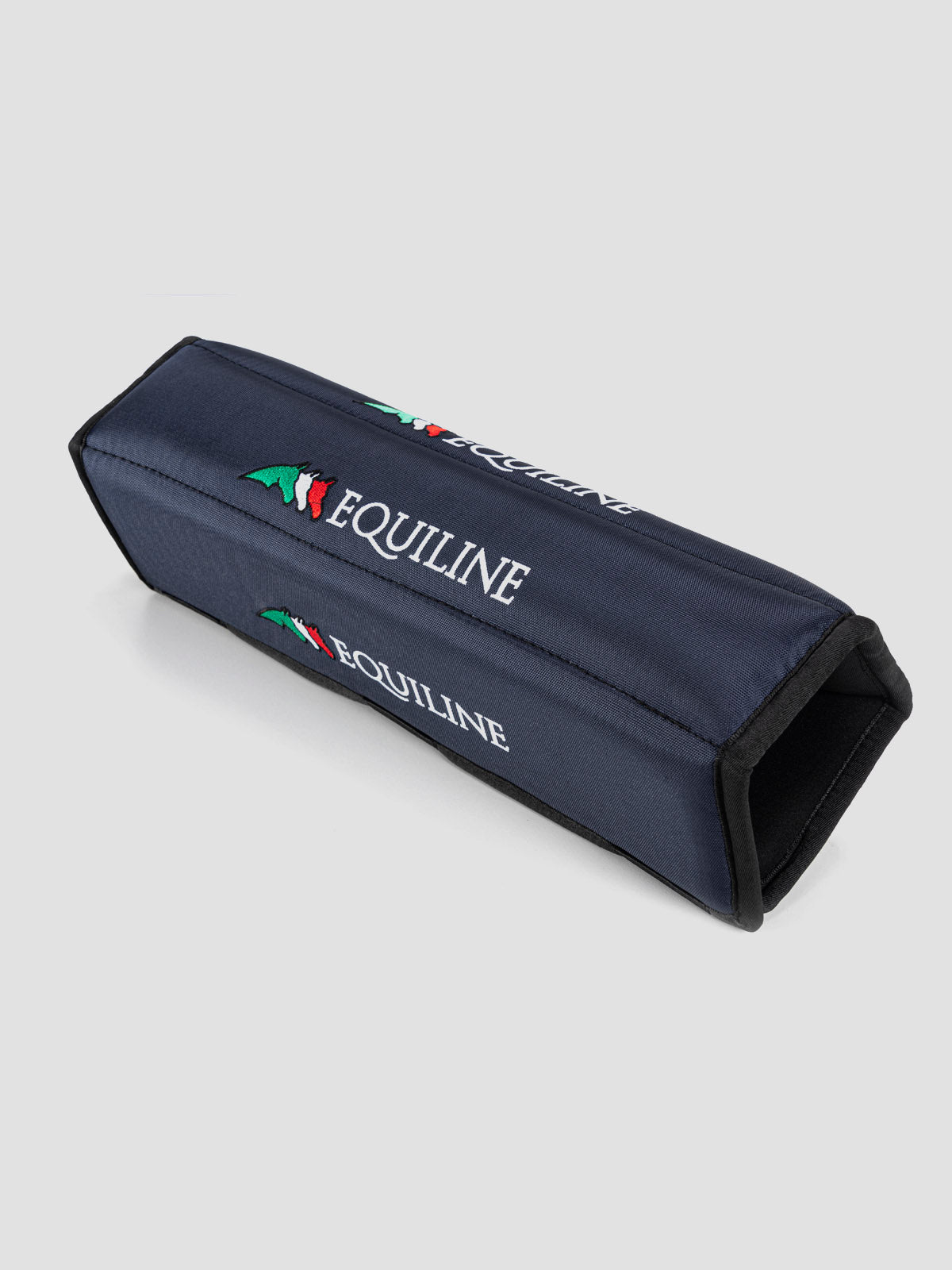 Protect your horse in their stable either at home and away with the Equiline padded head protector.