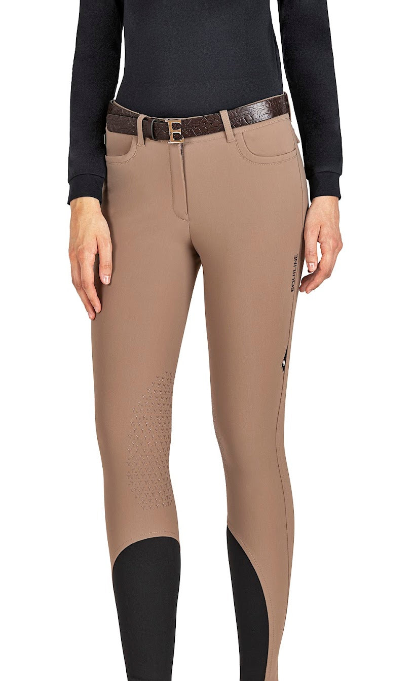 The Equiline Camel Etraek breeches are made from the new B Move bonded fabric for flexibility and durability when riding.    Finished with a silicone knee grip for security in the saddle and an elasticatend fabric on the lower leg for close contact.