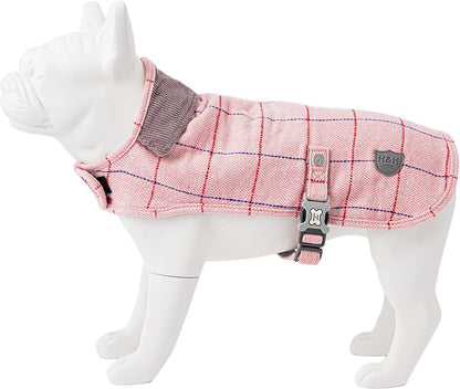 The tweed dog coat by Hugo and Hudson is available in pink and dark green.    It’s fleece lined but still light and breathable. Fastened with a Velcro strap round the chest and an adjustable buckle strap round the belly.