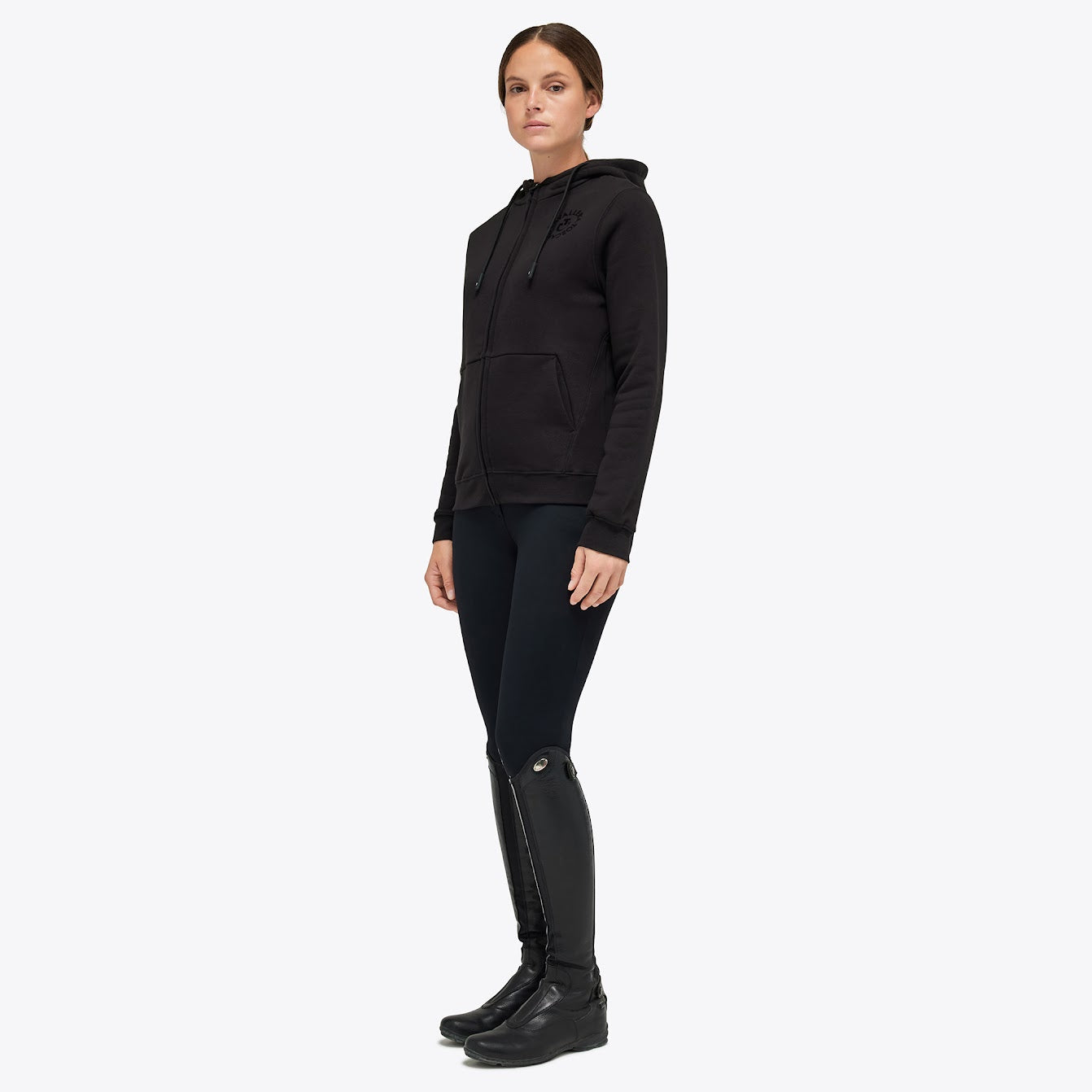 The Cavalleria Toscana Orbit black zip through hoody has the new ct orbit logo on the front. Perfect for the yard or shows. The CT hoody is made from super soft stretch jersey with a fleece lining.  Machine washable 