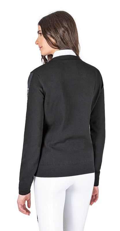 The Equiline Cinoc Black V Neck jumper is great for the shows or the yard. The jumper has a luxury feel and a flattering fit. The Equiline Matt satin line with raised white Equiline logo gives this jumper a modern twist.  Matching items available  70% Viscose, 30% polyester  Machine Washable