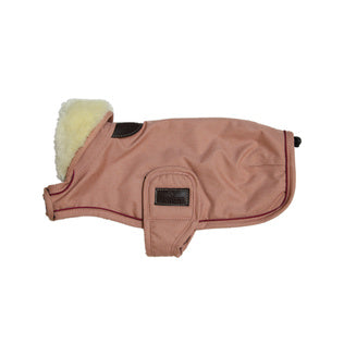 The Kentucky Coral Waterproof Dog Coat  offers every dog a dry, warm rug during the cold and wet winter days. Filled with a warming 160g and also featuring an artificial faux fur lining for extra comfort. This also creates tiny air pockets that trap and retain the body heat of the dog.