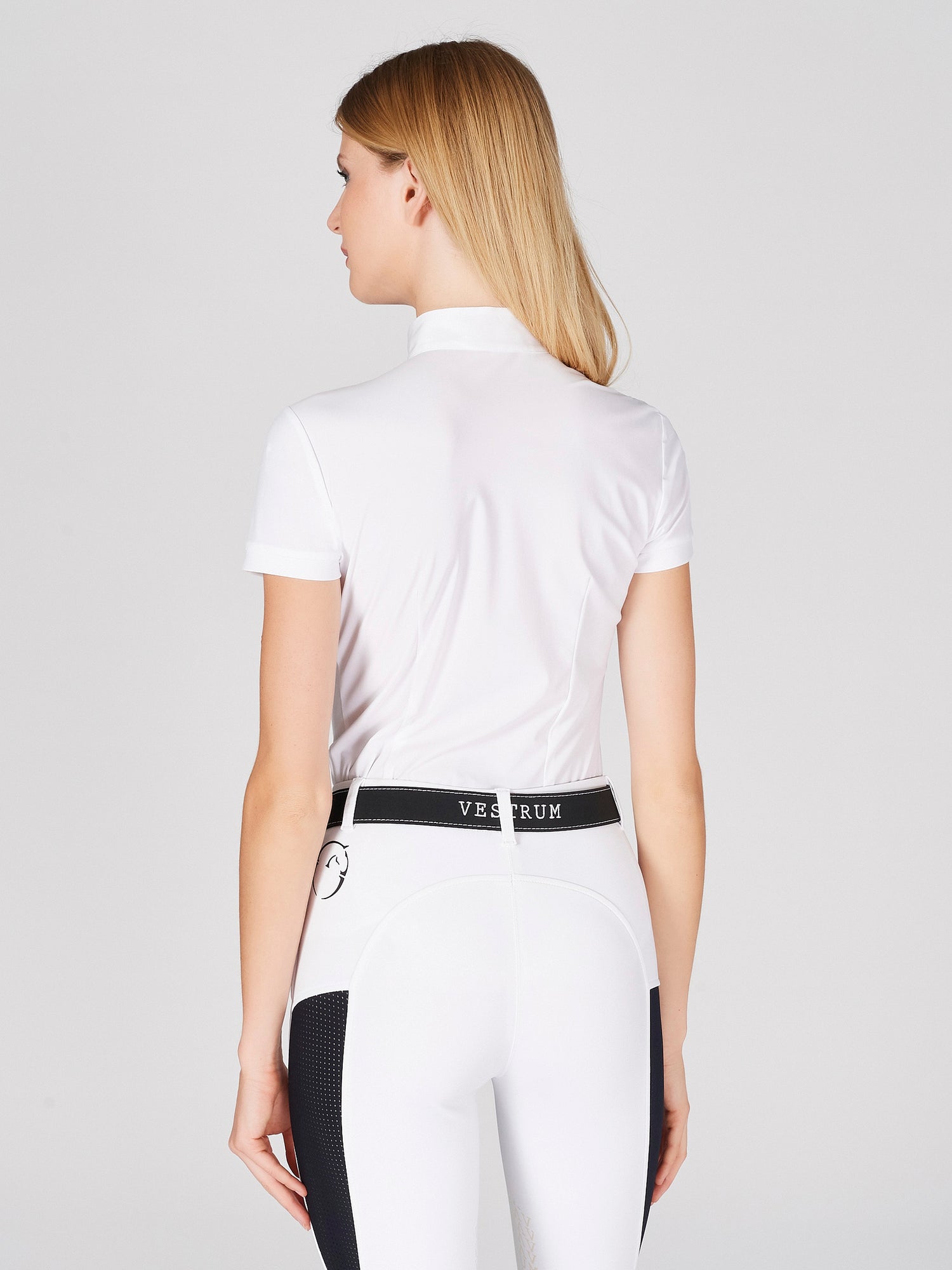 The Vestrum Maratea white Show Shirt is an update on a classic white shirt. The show shirt is made from bi stretch technical fabric for maximum movement and comfort. The black shine design features the Vestrum logo within the design.    Machine washable