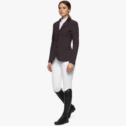 The Plum Cavalleria Toscana show jackets has all the features you expect from CT in the sophisticated plum colour. Featuring black stud buttons and zip opening for that perfect fit and securing whist wearing. Finished with black contrast trims and the iconic Cavalleria Toscana logo on the sleeve.  Matching items available.  Machine washable.