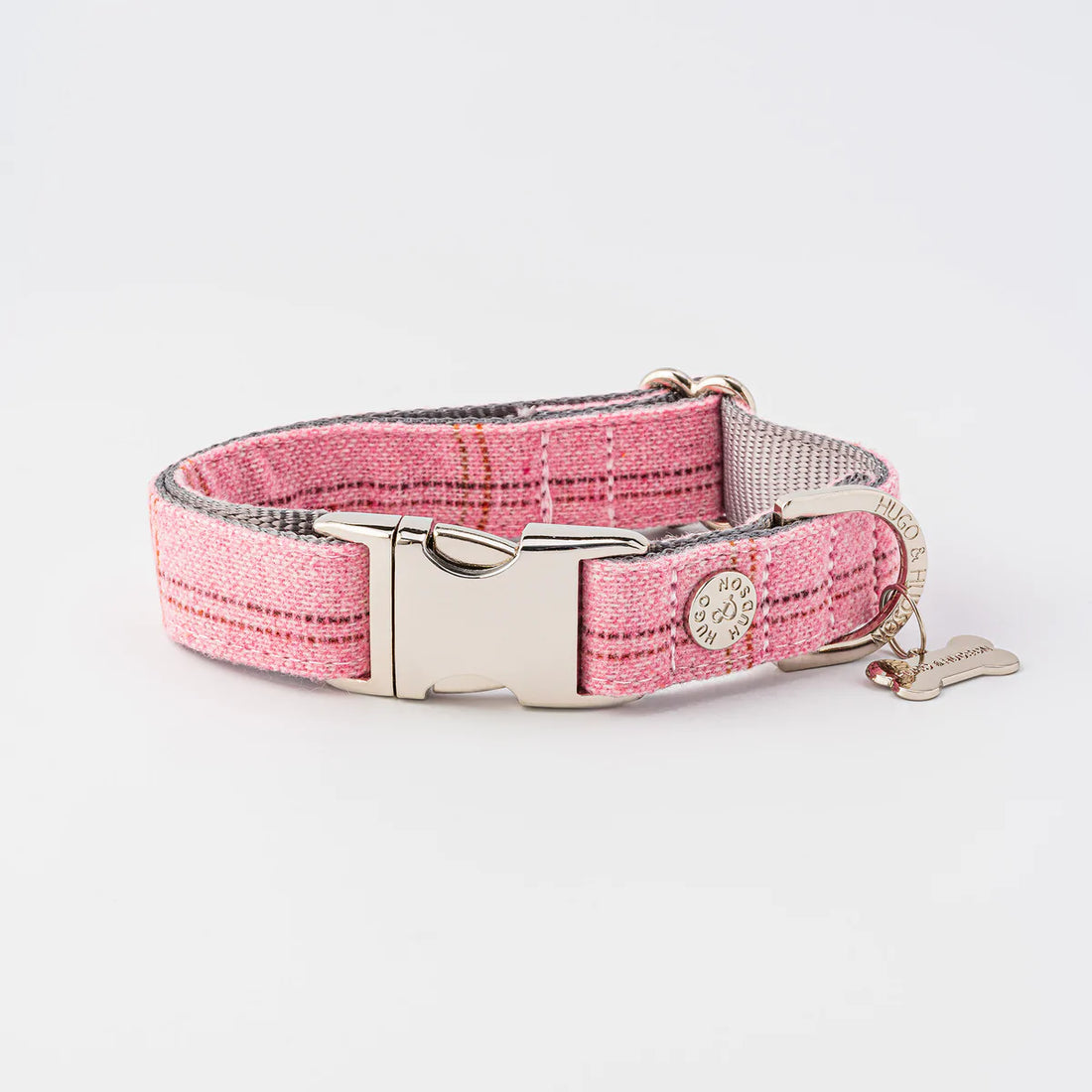 Hugo and Hudson Pink Tweed Dog Collar   This beautiful pink checked tweed collar is from the Hugo and Hudson premium fabric collection.