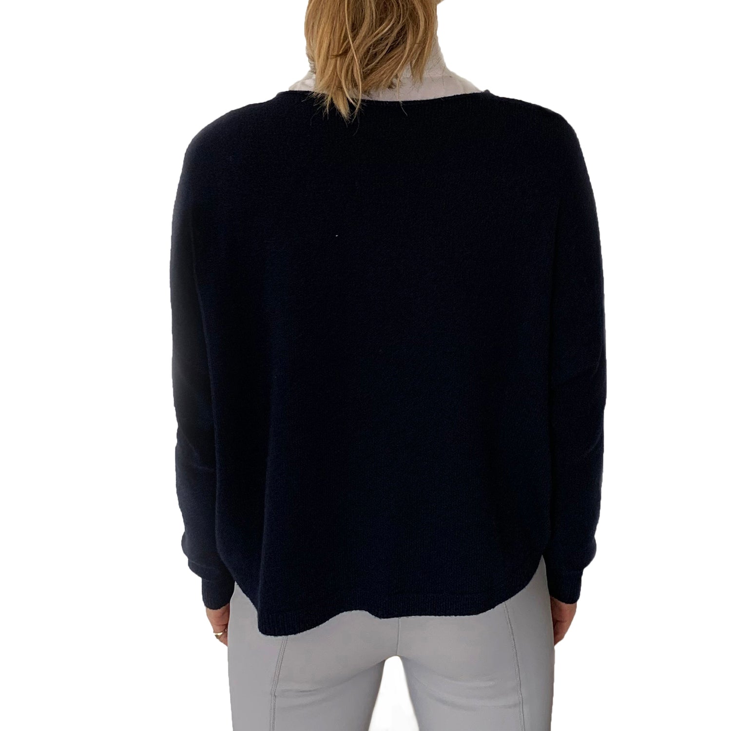 Round Neck jumper with front pocket detail.  This versatile jumper is super soft and an easy piece to have in your wardrobe. Great for shows when its a but chilly or equally usable on the yard.   50% Viscose  27%polyester  23% Polyamide
