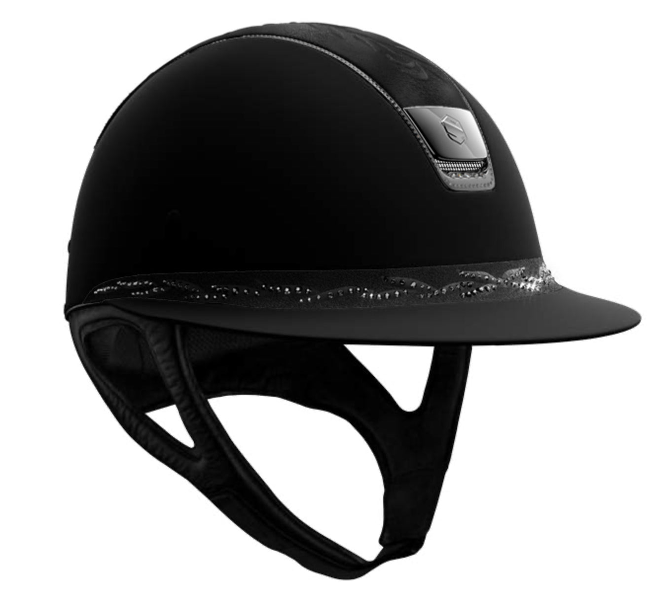 The Miss Shield Shadowmatt riding hat with black chrome blazon and trim. The top is in flower embroidery and the frontal band is in black Swarovski crystal flower. Finished with the 255x Swarovski crystal trim in Black Jet Hematite.