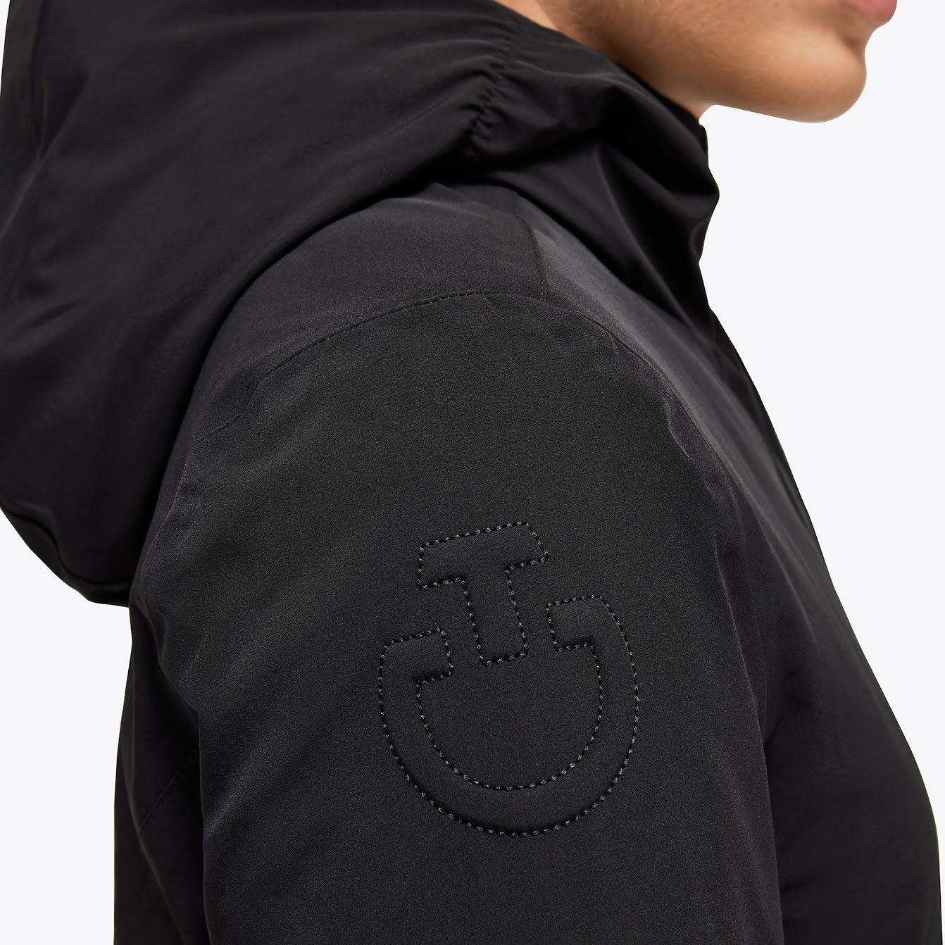 The Cavalleria Toscana black Soft Shell Wind Proof Coat. Designed for outdoor riding and errands about the stables, this understated performance padded jacket is defined by logo details and fine Cavalleria Toscana materials.